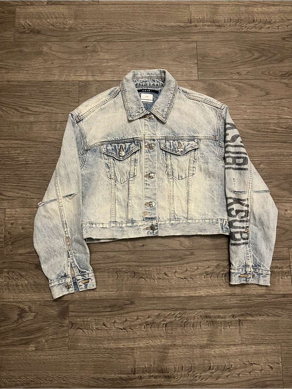 Ksubi Light Wash Denim Jacket with Sleeve Graphic